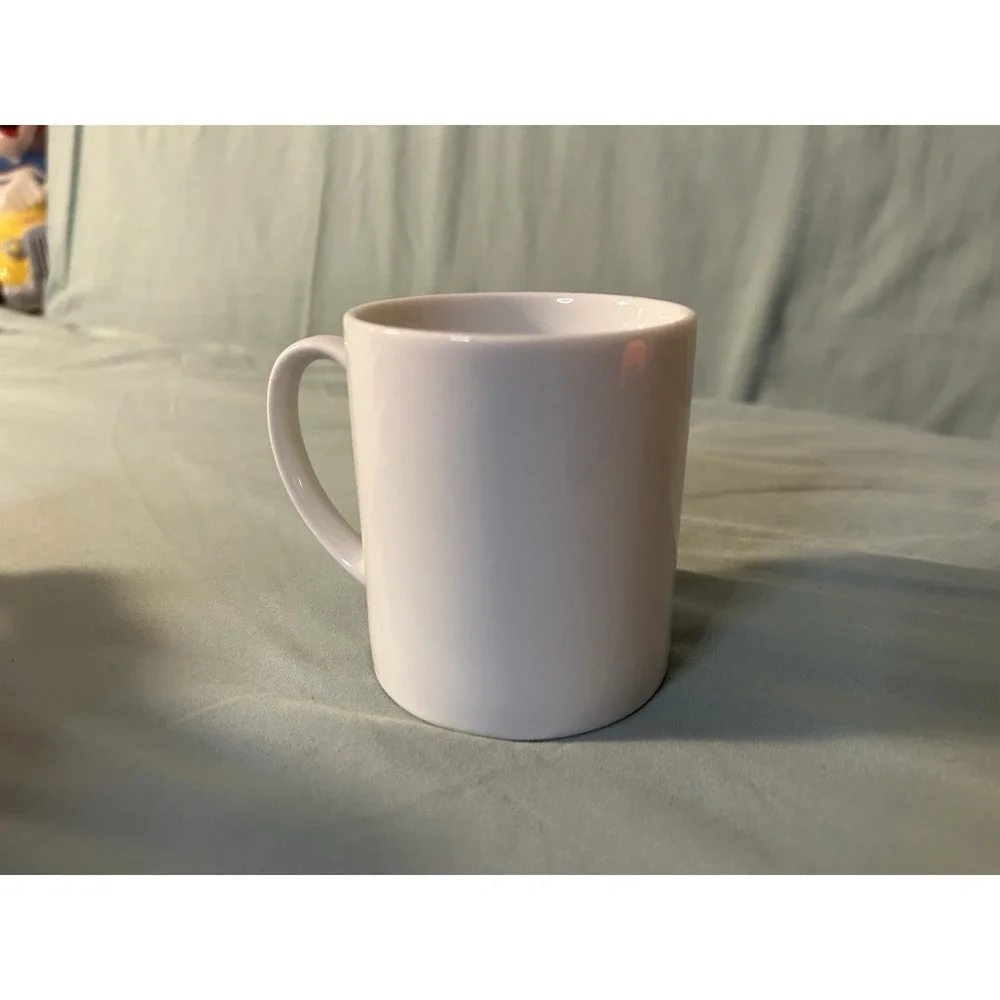 Egao Neko mug, a‎ lucky charm featuring a smiling cat (Maneki Neko)
